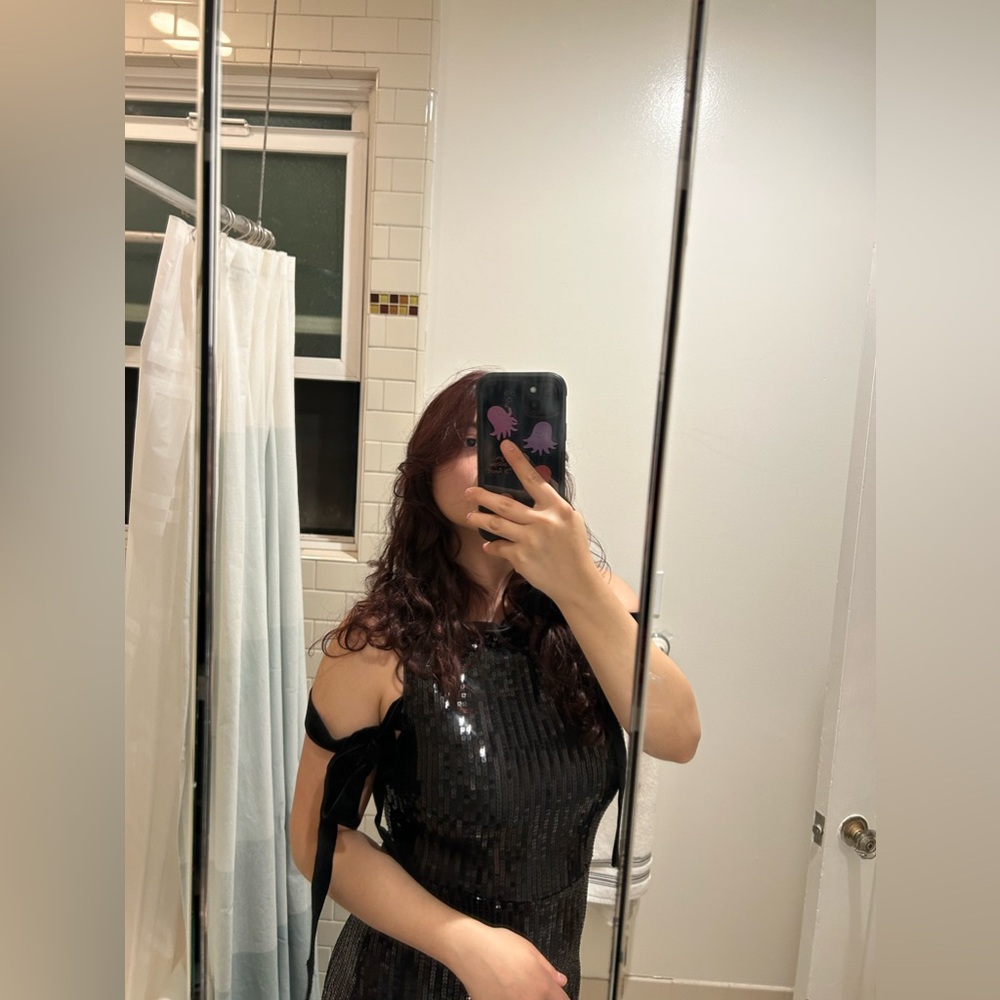 Long black sequin dress with shoulder ribbons